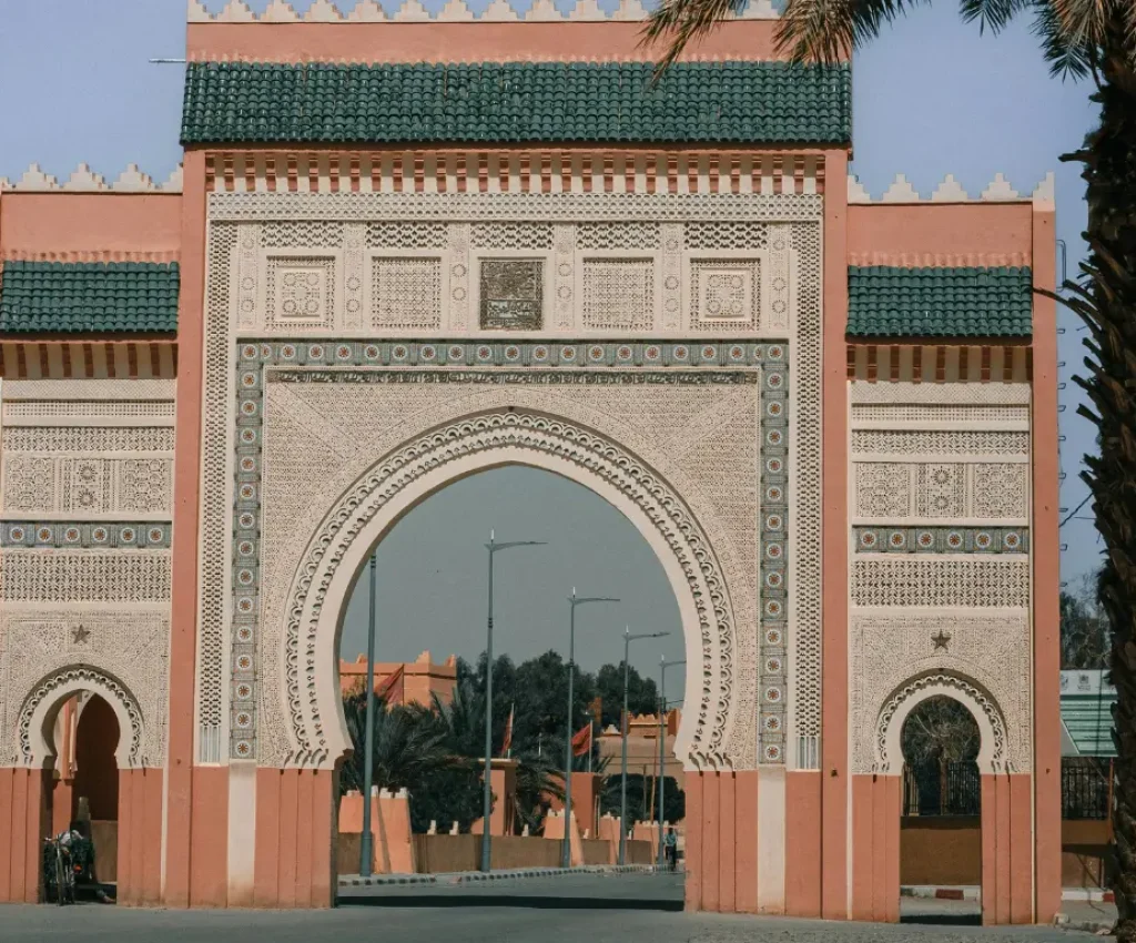 3-day tour from marrakech to merzouga The ornate main gate of Rissani, Morocco, with traditional Moorish architecture, often visited during a 3-day tour from Marrakech to Merzouga.