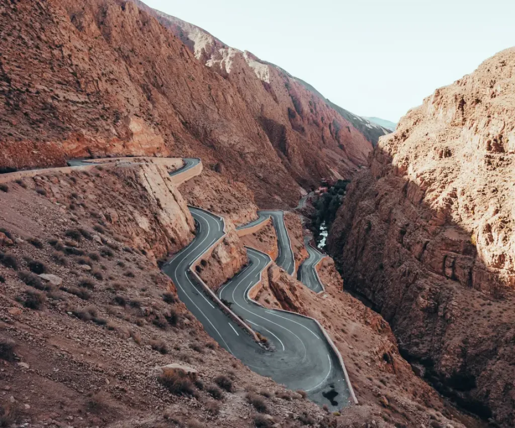 Winding road through Dades Gorge, a dramatic mountain pass on the 4-day trip from Marrakech to Fes.