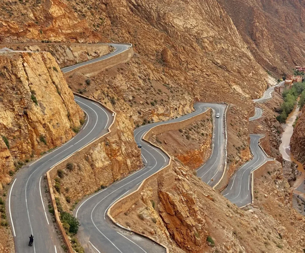 Scenic Mountain Drive on the Marrakech to Fes Desert Tour 4 Days Winding mountain road in the Dades Gorges, Morocco, along the Marrakech to Fes Desert Tour 4 Days route.